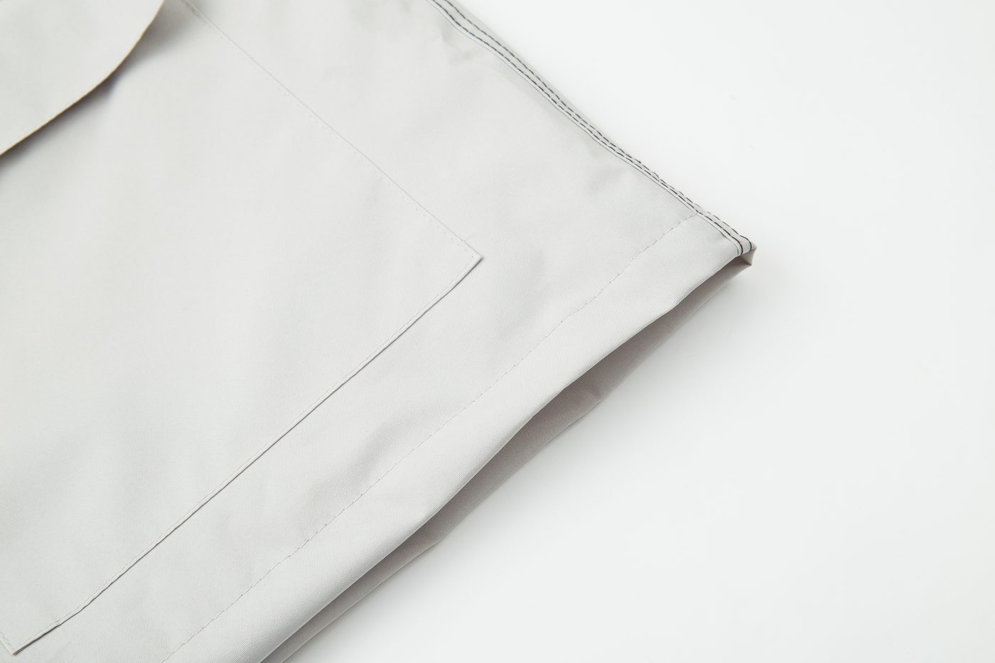 Clean flat-felled stitching on the grey panel