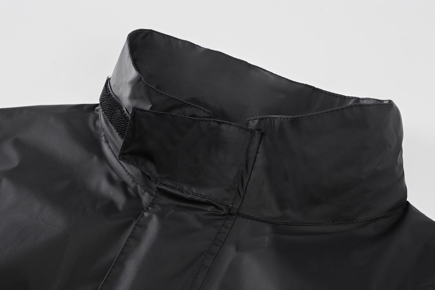 High collar with hook-and-loop chin guard closure