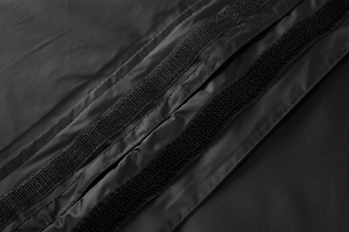 Front closure: SINOLL-branded 5# nylon waterproof zipper under hook-and-loop storm flap