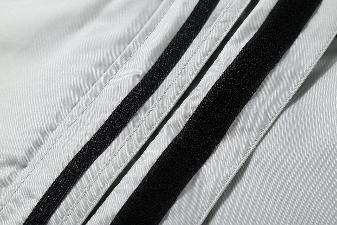 Double storm flap over the full-length zip