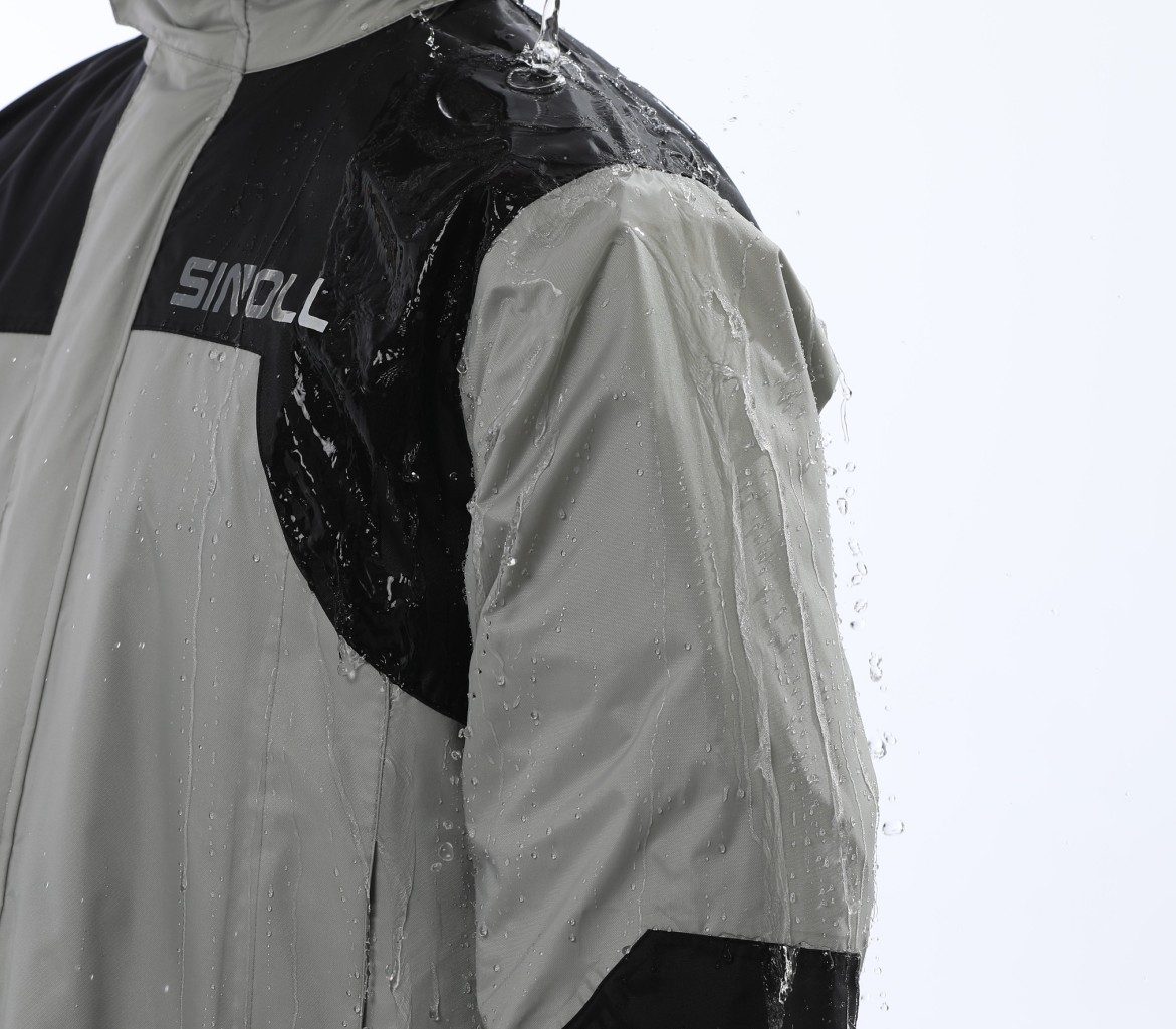 SN-105 in the rain — water streaming off the 210D Nylon Oxford shell, PU-coated and DWR level-4 finished