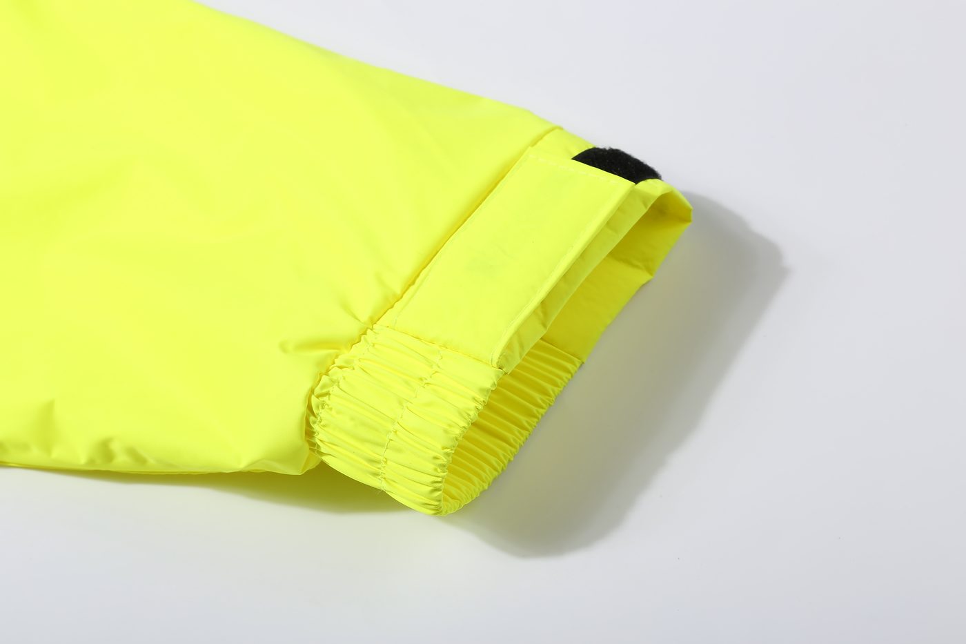 Fluoro Yellow sleeve cuff with elastic gather and hook-and-loop tab