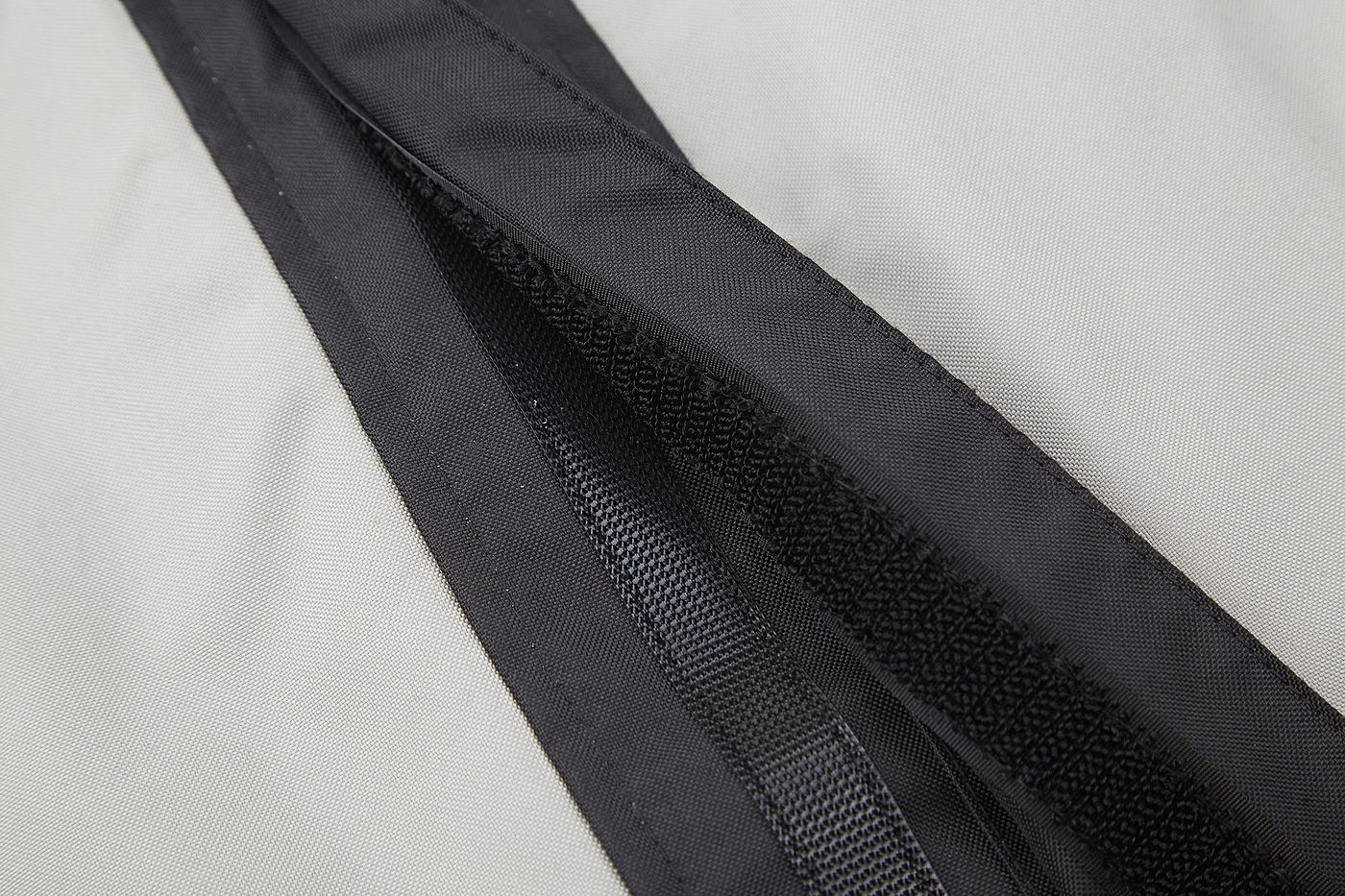Double storm flap construction in black